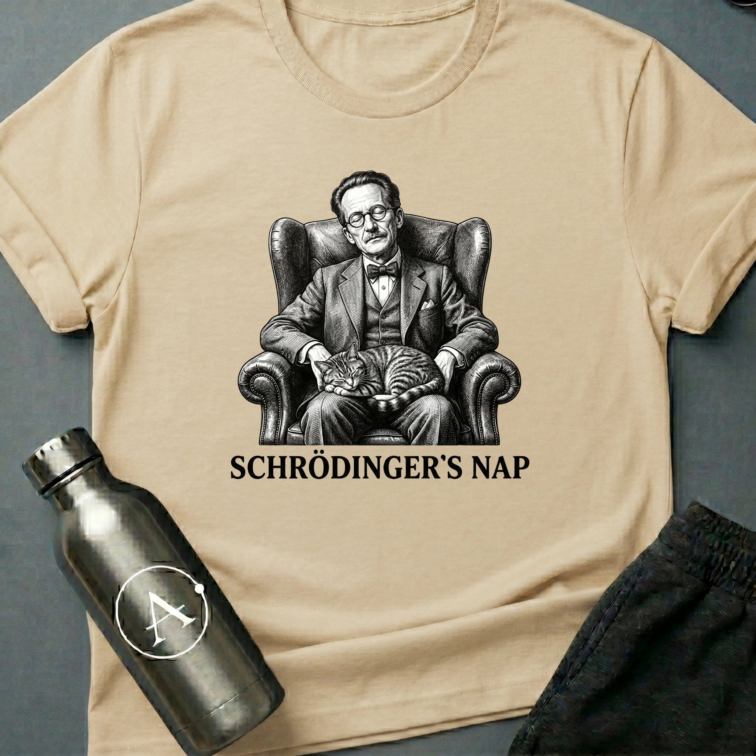 Schrödinger's Nap sci-fi t-shirt — vintage engraving of Schrödinger asleep in armchair with cat — Natural unisex tee — Apsion Outpost