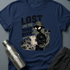 Tourist Trap sci-fi t-shirt — alien tourist lost on Earth with bucket hat and useless map — White unisex tee — Apsion Outpost