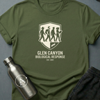 Anomaly Response Division sci-fi t-shirt — Glen Canyon biological-response field unit shield — Military Green unisex tee — Apsion Outpost