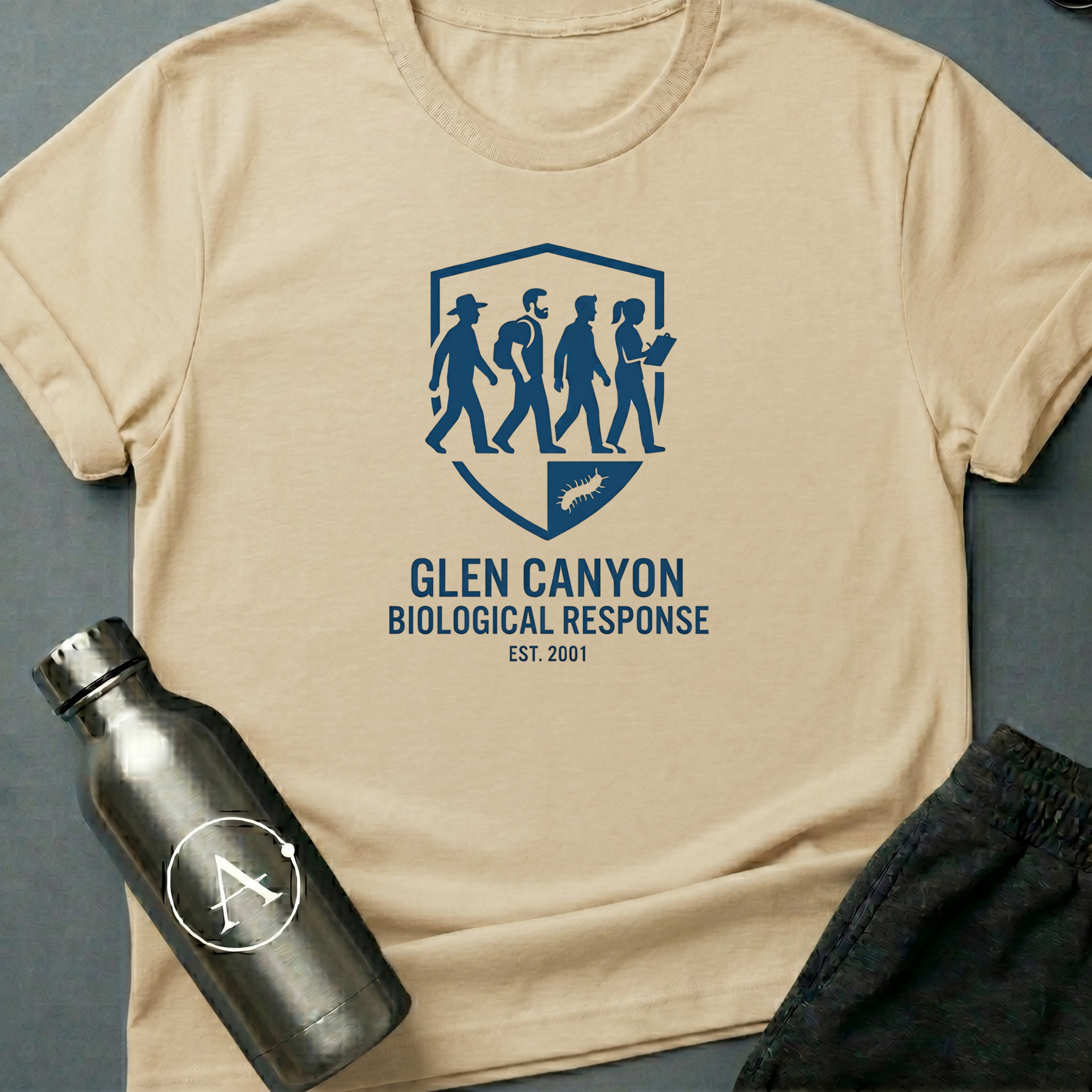 Anomaly Response Division sci-fi t-shirt — Glen Canyon biological-response field unit shield — Natural unisex tee — Apsion Outpost