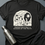 Shadow Watchers sci-fi t-shirt — two chained figures in a cave watching shapes on a wall while a bright sun shines outside — Black unisex tee — Apsion Outpost