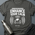 Compulsory Chill sci-fi t-shirt — a state-issued sonic calming device emitting wellness compliance signals — Dark Heather unisex tee — Apsion Outpost