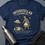 Better Homes and Galaxies sci-fi t-shirt — a 1950s alien housewife with a UFO vacuum beaming up humans from Earth — Navy unisex tee — Apsion Outpost