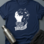 Ceiling Was Painted On sci-fi t-shirt — a head opening into deep space with a tiny figure walking off the edge, above a banner of text — Navy unisex tee — Apsion Outpost