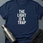 Refused Boarding sci-fi t-shirt — heavy stencil type reading THE LIGHT IS A TRAP over a warning line — Navy unisex tee — Apsion Outpost